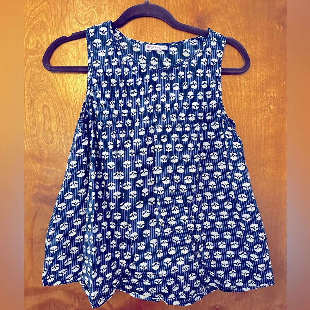 Cute swing sleeveless top